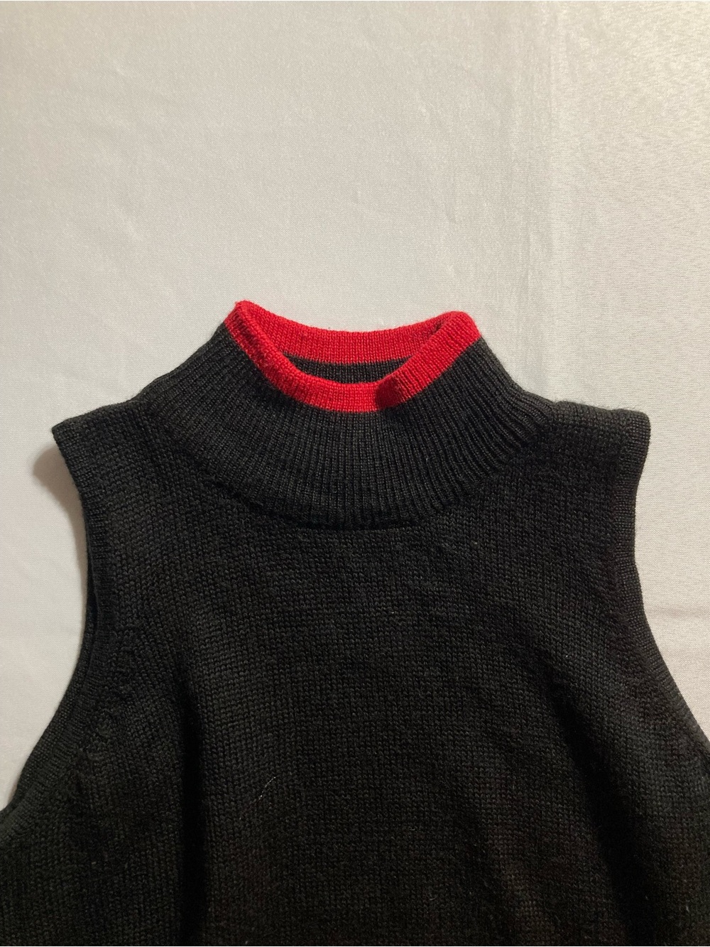 Sleeveless Black Knit Turtleneck Sweater Vest with Red Trim - Picture 3 of 4